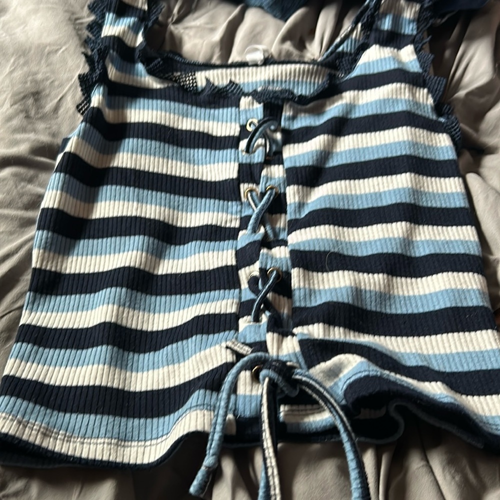 Colors: light and dark blue, white